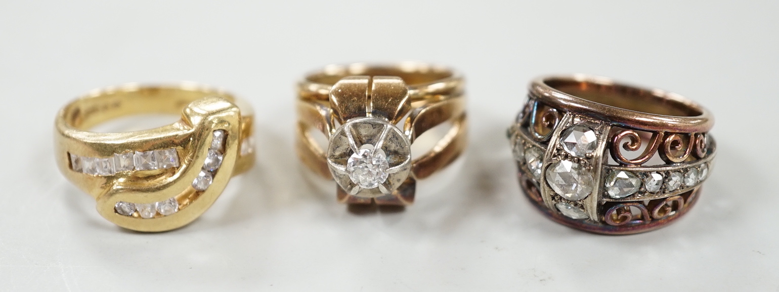 A continental yellow metal and rose cut diamond set cluster ring, with pierced setting, size M and two other yellow metal rings, one set with solitaire diamond, gross weight 25.7 grams.